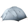 A gray colored, 4 person backpacking tent displayed erected with its doors closed.