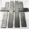 Five long pieces of Damascus steel material.