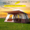 A large, brown colored 8 person tent displayed erected in a grass field.