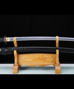 A Japanese Samurai Katana and its black scabbard diplayed on a wooden stand.