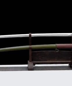 A one handed cavalry saber sword and its army green scabbard displayed on a wooden stand.