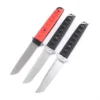 Three self defense folding knives with blades opened.