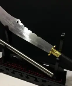 A Guan Dao weapon displayed next to its pole handle extension, on a wooden stand.
