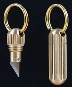 A small pendant knife shown both with the blade exposed and closed within its canister.