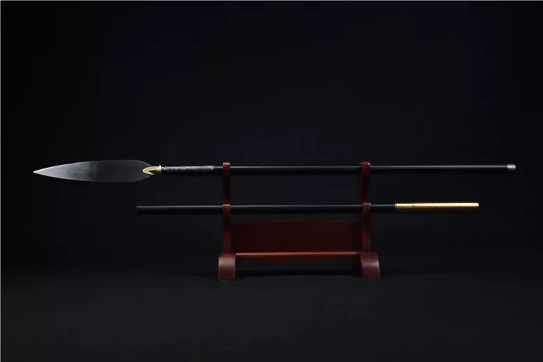 Leaf Spear A Chinese leaf spear weapon, displayed on a wooden stand with its pole handle extension.