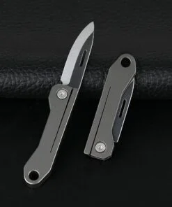 Two miniature pocket knives; one with its blade fully extended and the other in a closed position.