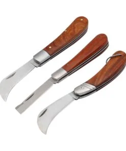 Three folding mushroom knives of different design, with blades opened.