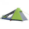 An erectedm green and gray colored tent, with its two entry doors opened.