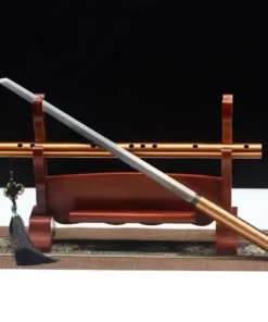 A secret sword displayed leaning against its flute scabbard, on a small wooden sword-stand.