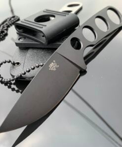 A fixed blade knife laning against a knife within a sheath.