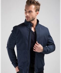 A man wearing a knife stab proof jacket.