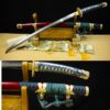 A Japanese Tachi sword Katana displayed leaning against its decorative scabbard, on a wooden stand, along with sword highlights below.