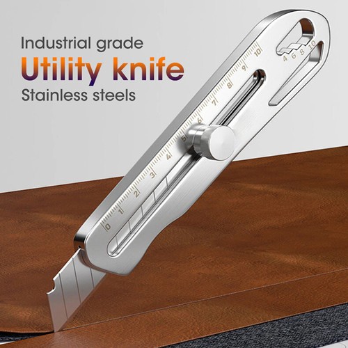 Carpenter Knife A retractable utility carpenter knife cutting into a timber board.
