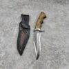 A professional survival knife with leather sheath