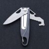 A multifunctional slim pocket knife with blades opened.
