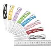 Eight thin folding knives with different color handles, next to a measurement ruler.