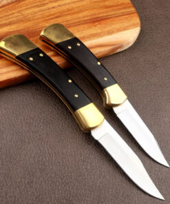Two automatic push button knife models.