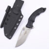 A small survival knife with fire starter and sheath.