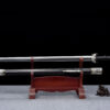 A dragon themed straight Chinese Jian sword and its scabbard displayed on a wood stand.