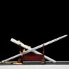 A straight silver colored sword and its scabbard displayed on a wooden stand.