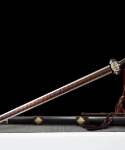A decorative sword with dragon handle, leaning against a small wooden sword-stand, along with its scabbard below on the floor.