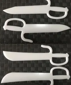 Two sets of practice butterfly knives, displayed side-by-side