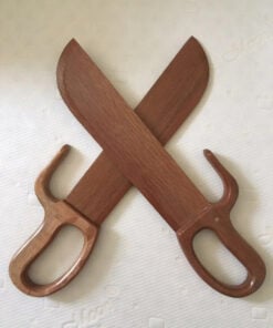 Two Wing Chun butterfly swords with blades crossed.