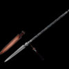 A steel spear with a long double edged blade next to its leather scabbard.