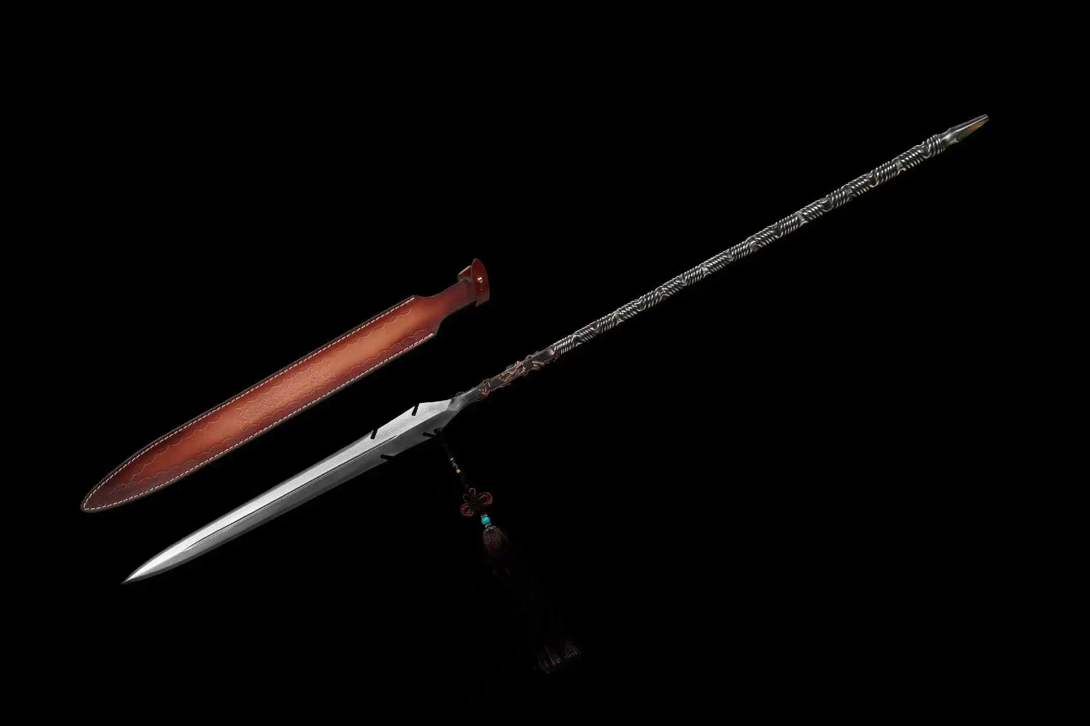 Metal Spear An all metal spear weapon displayed next to its leather sheath.
