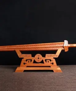 A peach wood word displayed on a wooden-sword stand.