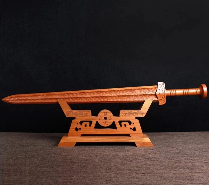 Peach Wood Sword A peach wood word displayed on a wooden-sword stand.