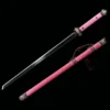 A Chinese pink Dao sword displayed next to its scabbard.