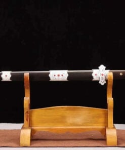 A Chinese Dao shortsword sheathed within its decorated scabbard, displayed on a wooden stand.