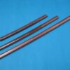 Three Suburito bokken swords of differing lengths displayed against a blue color floor.