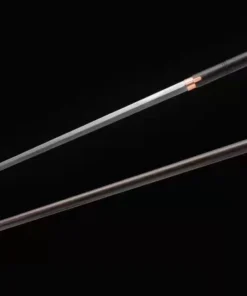A straight, double edged, sword staff next to its scabbard.