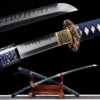 A Japanes Katana sword and its scabbard, with a blue color scheme leaning against a wooden stand.