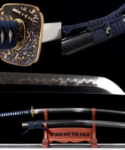 A Japanese Katana sword and its scabbard displayed on a wooden stand, with sword highlights above.