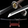 A sheathed dragonfly Katana sword, displayed on a small wooden sword-stand.