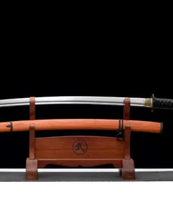 A type 98 Gunto sword and its wood scabbard displayed on a small wooden stand.