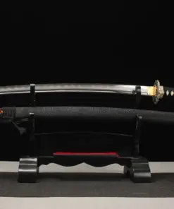 A Kobuse Katana sword saber and its black scabbard, displayed on a small wooden stand.