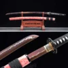 A red bladed Katana sword and its scabbard displayed on a wooden sword stand, and product highlights below.