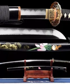 A floral sword Katana displayed next to its decorative scabbard, on a small wooden sword-stand.