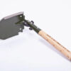 A military folding shovel, with its spare-head in a half folded position.