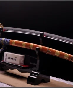 A custom made, Tachi saber sword displayed next to its decorative scabbard, on a small wooden sword-stand.
