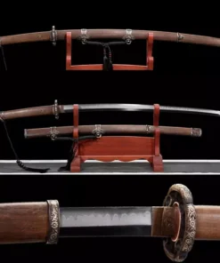 A Samurai Tachi sword displayed next to its brownwood scabbard, on a small wooden sword-stand.