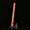 A custom made tomahawk with a long wooden handle.