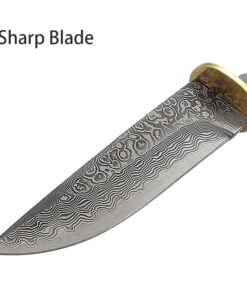A Damascus knife blade blank displayed with a brass hand-guard.