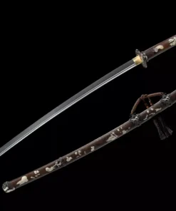 A Tachi sword for sale, displayed next to its decorative scabbard.