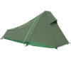 A green colored, solo tent displayed erected.