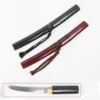 Two sheathed Tanto knives of differing colors, along with an unsheathed Japanese tanto knife below.
